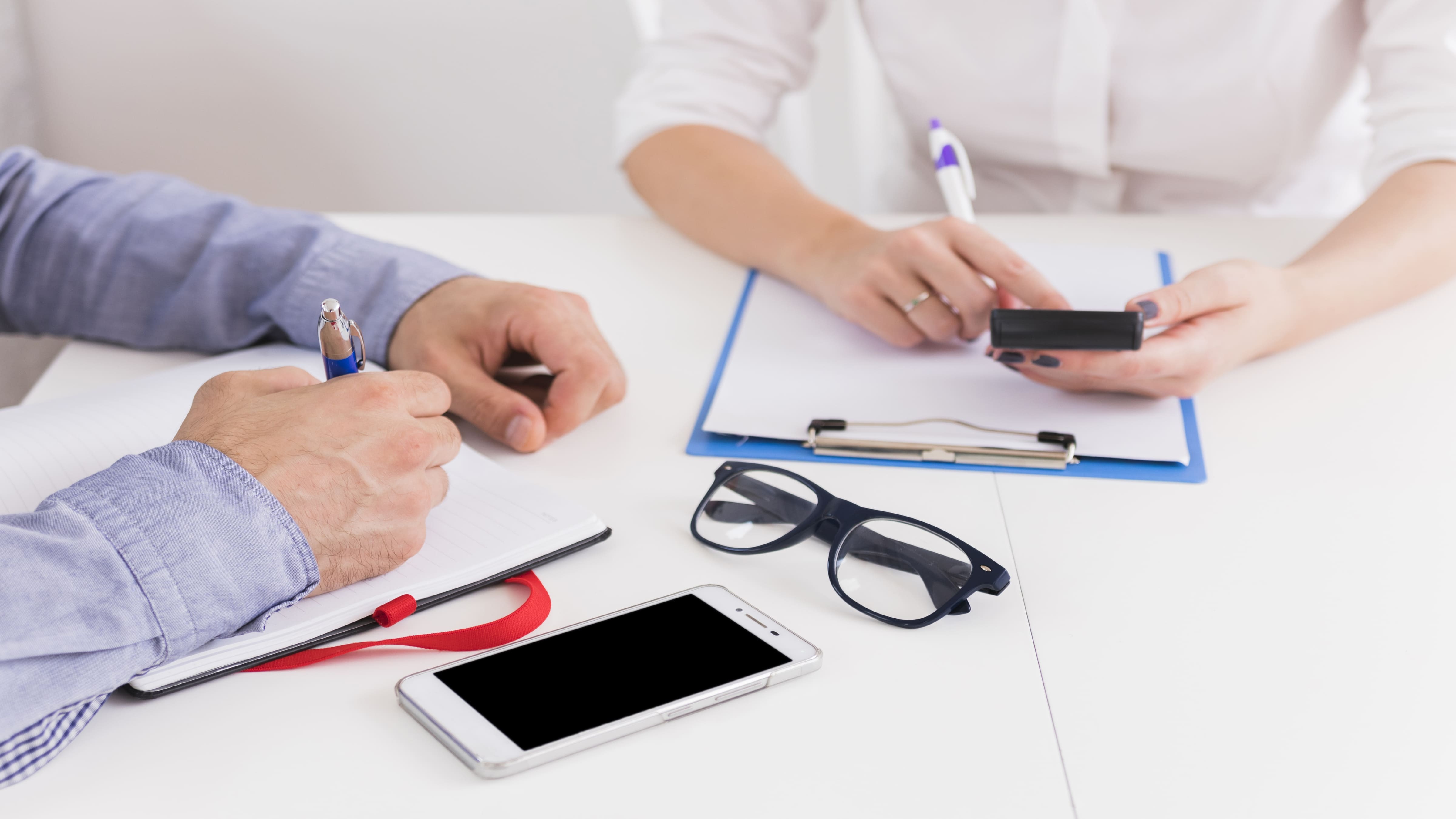 close up businessman businesswoman working workplace 2 2